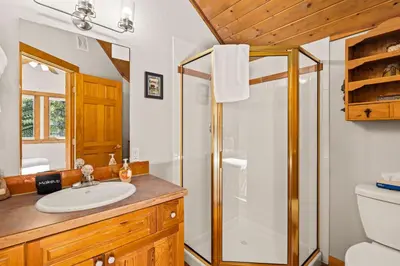 a bathroom with a sink and a shower at Creekside Condos H by Estes Park Condos in Estes Park