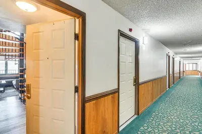 an open door to a hallway with a corridorngthngthngthngthngthngthngth at Hot Tub and Indoor Pool Access at Granby Condo in Granby