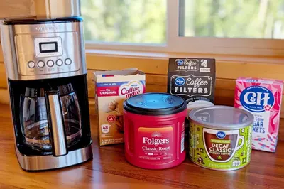 a counter with a coffee maker and some food at New Log Home, Hot Tub For 8, Views! in Tabernash