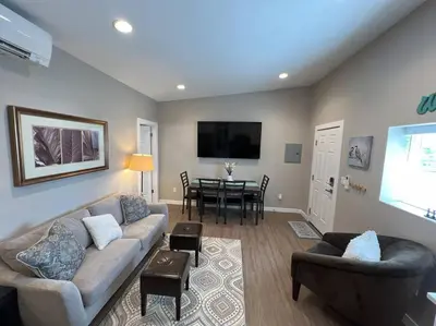 a living room with a couch and a table at Chic & intimate 2 bedroom in Brighton