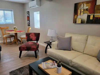 a living room with a couch and a table at Calm and relaxing 1 bed in Brighton