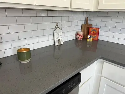 a kitchen counter with a counter top with a stove top at Peaceful 2 bed in Westminster in Westminster