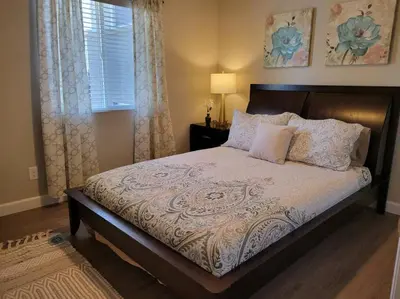 a large bed in a bedroom with a window at Charming 2 bed in Westminster in Westminster