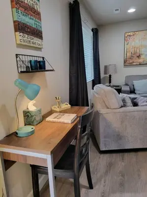 a living room with a table and a couch at Charming 2 bed in Westminster in Westminster