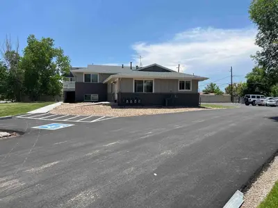 an empty parking lot in front of a house at Charming 2 bed in Westminster in Westminster