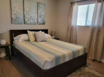 a bedroom with a bed with pillows and a window at Charming 2 bed in Westminster in Westminster