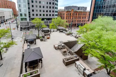 an overhead view of a city plaza with tables and benches at Downtown Denver Condo in the Center of the City! in Denver