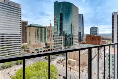 a view of a city skyline from a balcony at Downtown Denver Condo in the Center of the City! in Denver