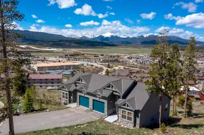 an aerial view of a town with mountains at 6 Mi to Skiing Mtn-View Fraser Duplex in Fraser