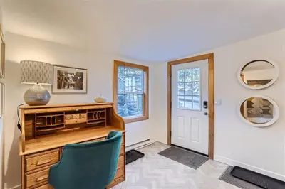 a home office with a desk and two chairs at Nederland Mountain Haven bungalow in Nederland