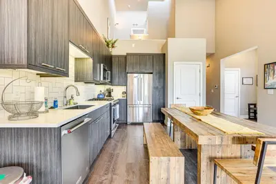 a kitchen with wooden cabinets and a wooden counter top at Walk to Dtwn Fraser Retreat with Hot Tub and Views! in Winter Park
