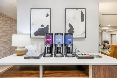 a table with three complimentary products on it at Hampton Inn Aurora Medical Center Denver in Aurora