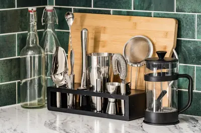 a kitchen counter with a tray of kitchen utensils at Denver Emerald - Close to Red Rocks, Arvada & Downtown in Denver