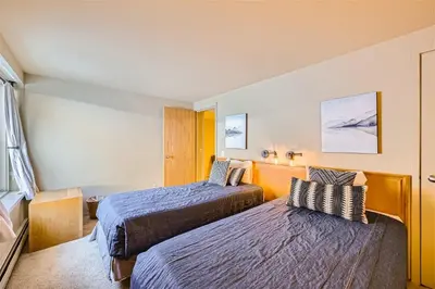 a hotel room with two beds in it at 2509 Saints John condo in Keystone