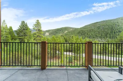 a balcony with a view of the mountains at Clearwater Lofts 205 Building 3 in Keystone