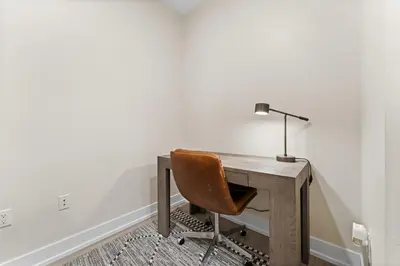 a desk with a chair and a lamp on it at Clearwater Lofts 205 Building 3 in Keystone