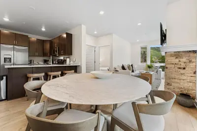 a kitchen and dining room with a table and chairs at Clearwater Lofts 205 Building 3 in Keystone