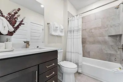 a bathroom with a sink and a toilet and a shower at Clearwater Lofts 205 Building 3 in Keystone