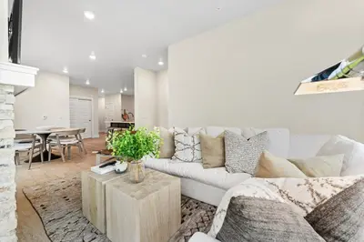 a living room with a white couch and a table at Clearwater Lofts 205 Building 3 in Keystone