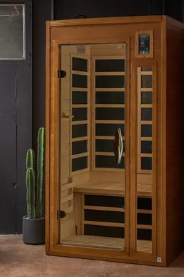 a wooden cabinet with a cactus in a room at NEW Modern, Luxury Home with Hot Tub, Gym, Sauna, and 12 Minutes to Denver in Arvada