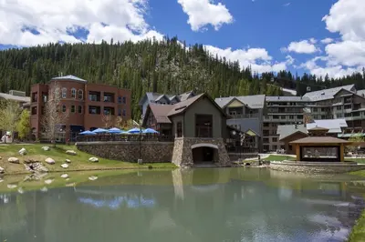 a large body of water in front of a resort at Iron Horse C4093 condo in Winter Park