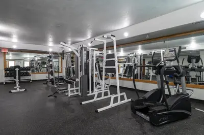 a gym with several treadmills and machines at Iron Horse C4093 condo in Winter Park