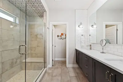 a bathroom with a shower and a sink at Upbeat Retreat - Enjoy Bikes, Brews and Mtn Peaks! in Fort Collins