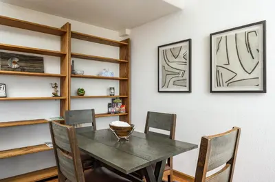 a dining room with a table and chairs at Mountain View Apartment Near Downtown & Hiking in Evergreen