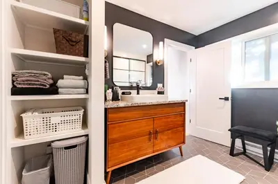 a bathroom with a sink and a mirror at 30-Day Minimum Boulder Bright & Modern Private 1BR 2BA ADU in Boulder