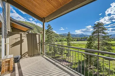 a balcony with a view of the mountains at 2151 The Pines condo in Keystone