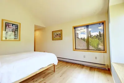 a bedroom with a bed and a window at 195 Summerwood home in Dillon