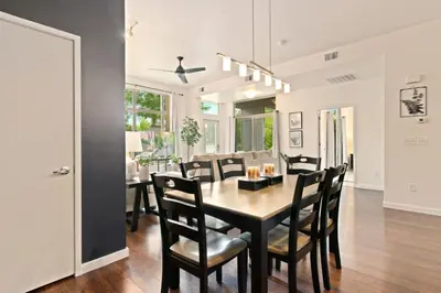 a dining room with a table and chairs at The Cozy Corner Retreat, 15 min walk to Old Town in Fort Collins