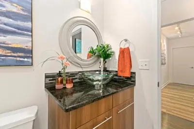 a bathroom with a sink and a mirror at The Cozy Corner Retreat, 15 min walk to Old Town in Fort Collins