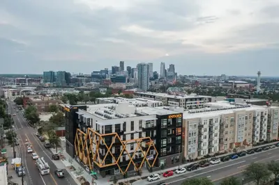an aerial view of a city with buildings at Serenity in Style | Espadin LoHi in Denver