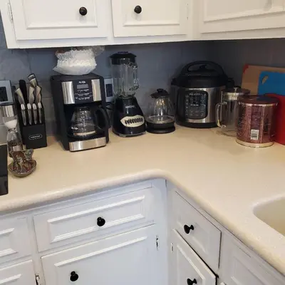 a kitchen counter with appliances on a counter top at 7 bedroom 8 beds family house in Denver