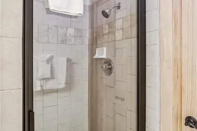 a bathroom with a shower with a glass door at 2BR Keystone Condo Near Ski Lifts and Trails in Keystone