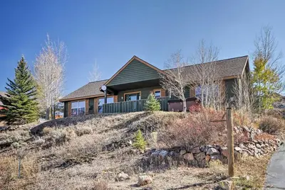 a house on top of a hill at Evergreen Ranch Family Vacation Home, Sleeps 8, Private Hot Tub in Granby
