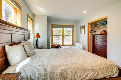 a bedroom with a large bed and a window at 8 Mi to Skiing Mtn-View Getaway in Frisco! in Frisco