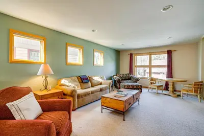 a living room with a couch and a table at 8 Mi to Skiing Mtn-View Getaway in Frisco! in Frisco