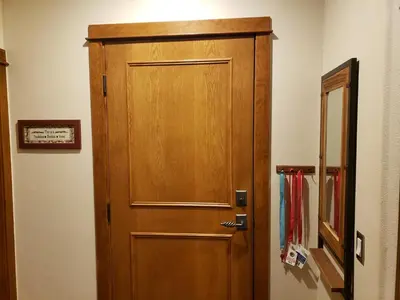 a wooden door in the corner of a room at 2 BR, 2 BA Mountain View Family Friendly Condo BCA-45499 in Keystone