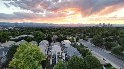 an aerial view of a city at sunset at Luxurious, Modern Townhome 5 minute Walk from Cherry Creek North in Denver