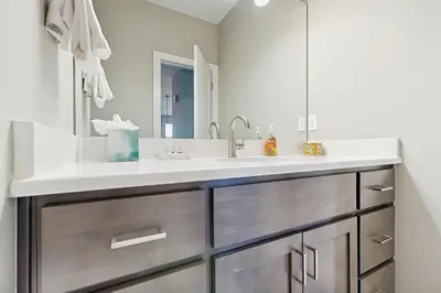 a bathroom with a sink and a mirror at Serene Escape in Fraser in Fraser