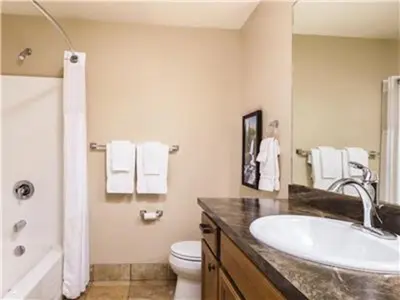 a bathroom with a sink and a toilet at Worldmark - Estes Park 1BD in Estes Park