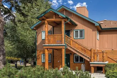 a house with a deck on the side of it at Worldmark - Estes Park 2BD in Estes Park