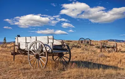 an old horse drawn wagon in a field at Worldmark Granby Rocky Mountain 2BD in Granby