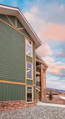 a house with a green at Worldmark Granby Rocky Mountain 2BD in Granby