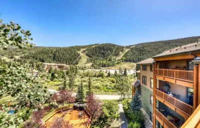 an aerial view of a resort with a mountain at Tenderfoot Lodge 2 Bedroom At The Mountain House Base in Keystone