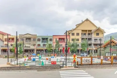 a playground in the middle of a city with buildings at Studio Condo At Gateway Lodge In Keystone in Keystone