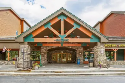 a store front with the entrance to a building at Cozy Ski-In Ski-Out Condo with Heated Pool in Keystone