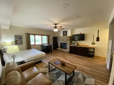 a living room with a bed and a couch at Gateway Lodge 5037 by SummitCove Lodging in Keystone